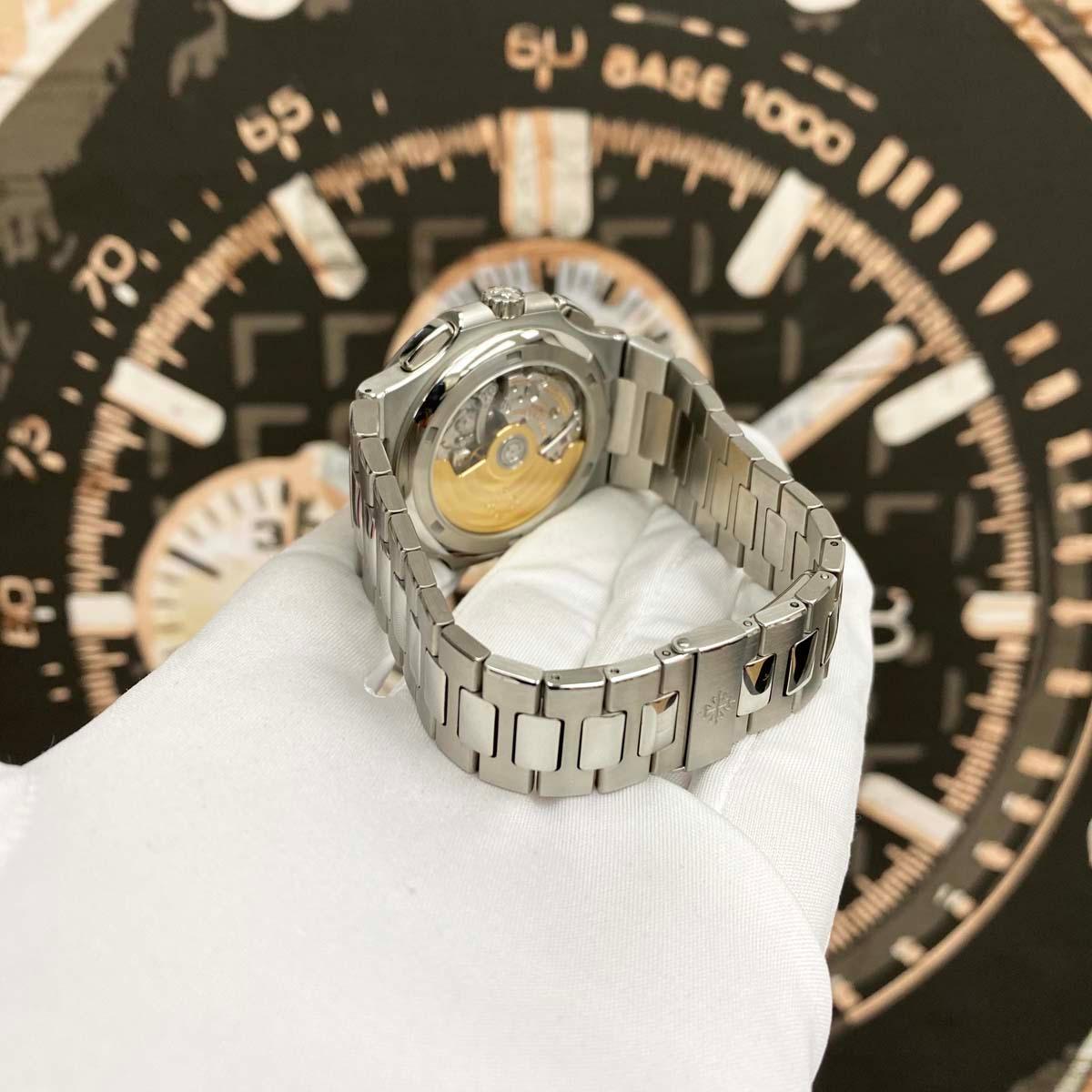Patek Philippe Nautilus Travel Time Chronograph 40mm 5990/1A Black Dial Pre-Owned - Gotham Trading
