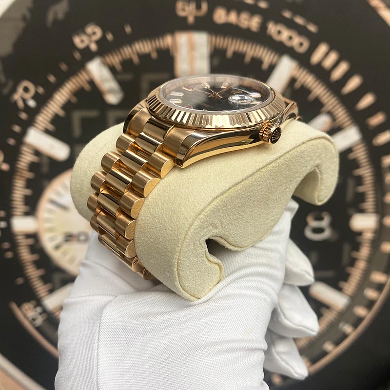 Rolex Day-Date 41 Presidential 218235 Fluted Bezel Ruby/Baguette Diamond Dial Pre-Owned - Gotham Trading