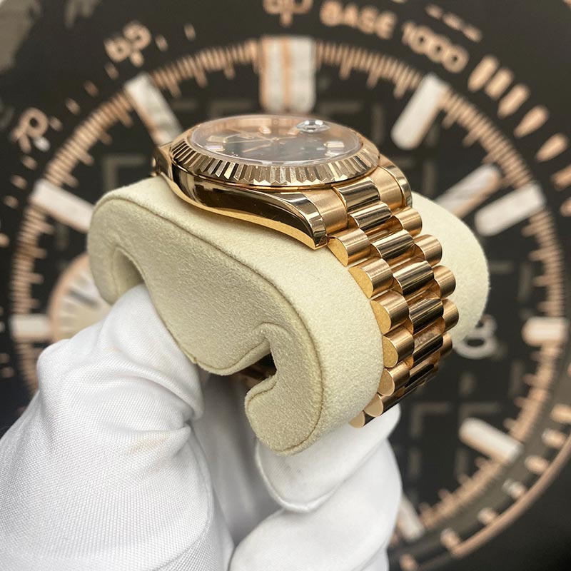 Rolex Day-Date 41 Presidential 218235 Fluted Bezel Ruby/Baguette Diamond Dial Pre-Owned - Gotham Trading