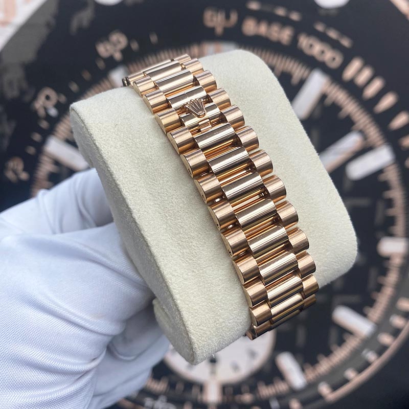 Rolex Day-Date 41 Presidential 218235 Fluted Bezel Ruby/Baguette Diamond Dial Pre-Owned - Gotham Trading