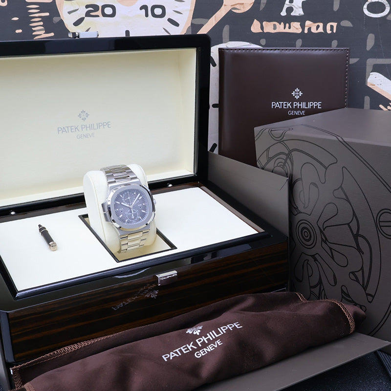 Patek Philippe Nautilus Travel Time Chronograph 40mm 5990/1A Black Dial 2017 Pre-Owned