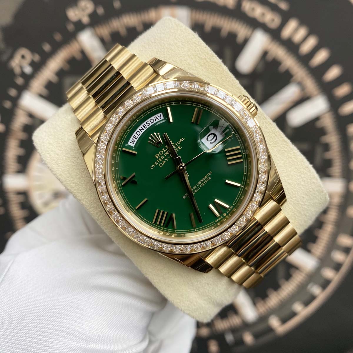 Rolex Day-Date 40mm Baguette Diamond Bezel 228398TBR Yellow Gold Green Roman Dial