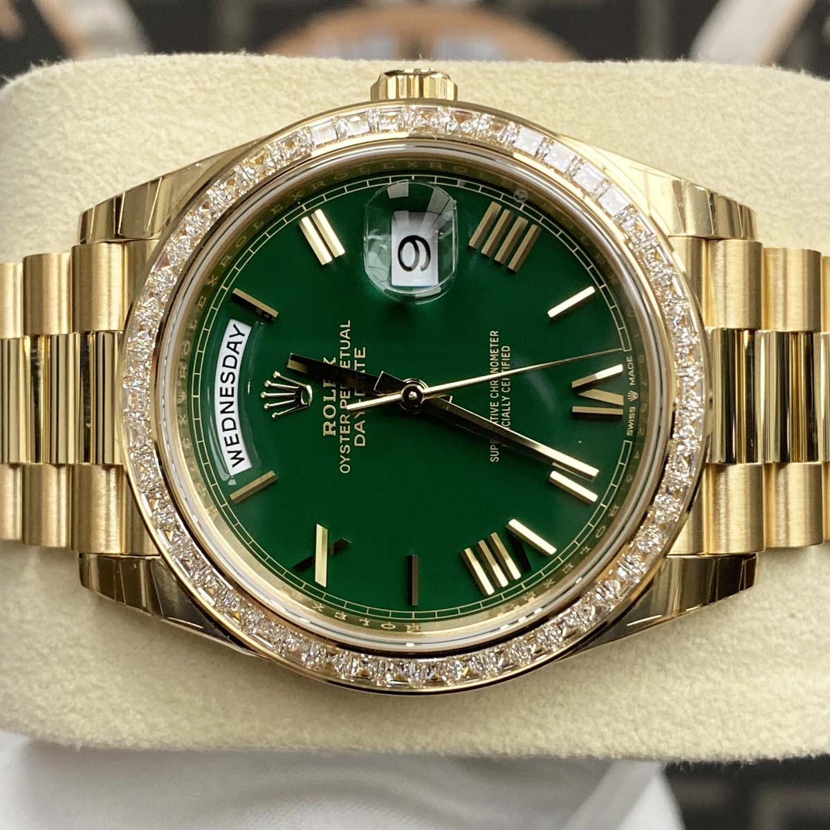 Rolex Day-Date 40mm Baguette Diamond Bezel 228398TBR Yellow Gold Green Roman Dial