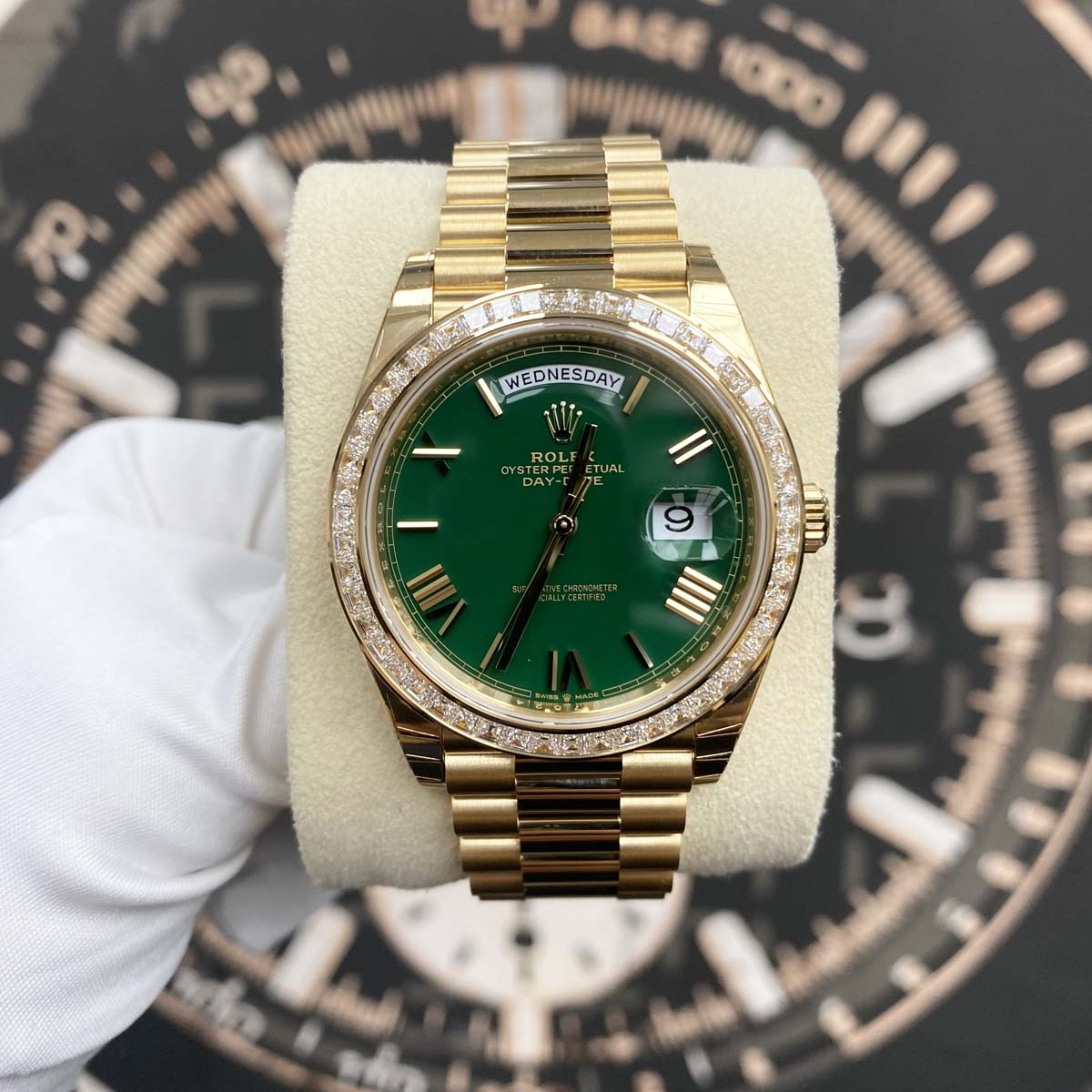 Rolex Day-Date 40mm Baguette Diamond Bezel 228398TBR Yellow Gold Green Roman Dial