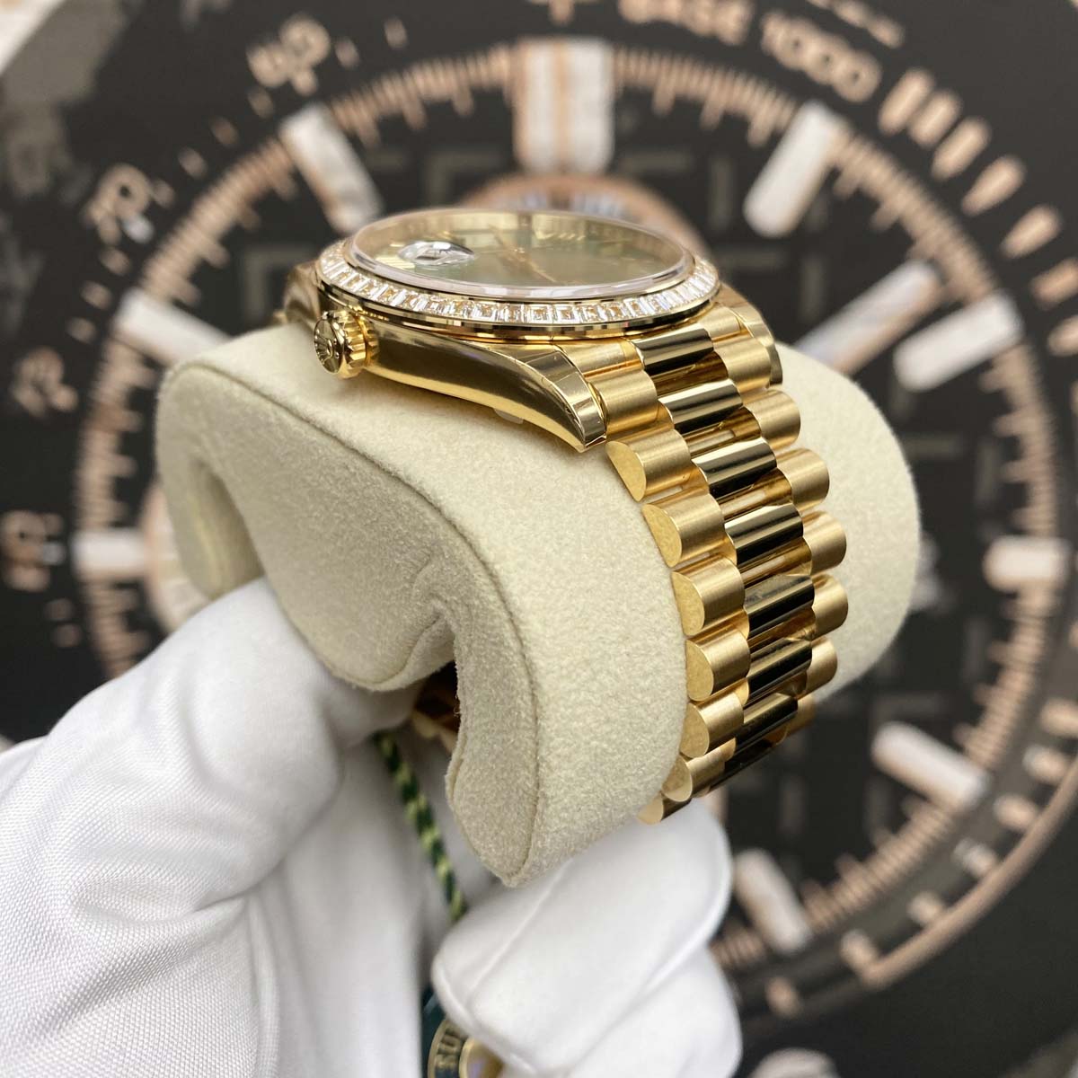 Rolex Day-Date 40mm Baguette Diamond Bezel 228398TBR Yellow Gold Green Roman Dial