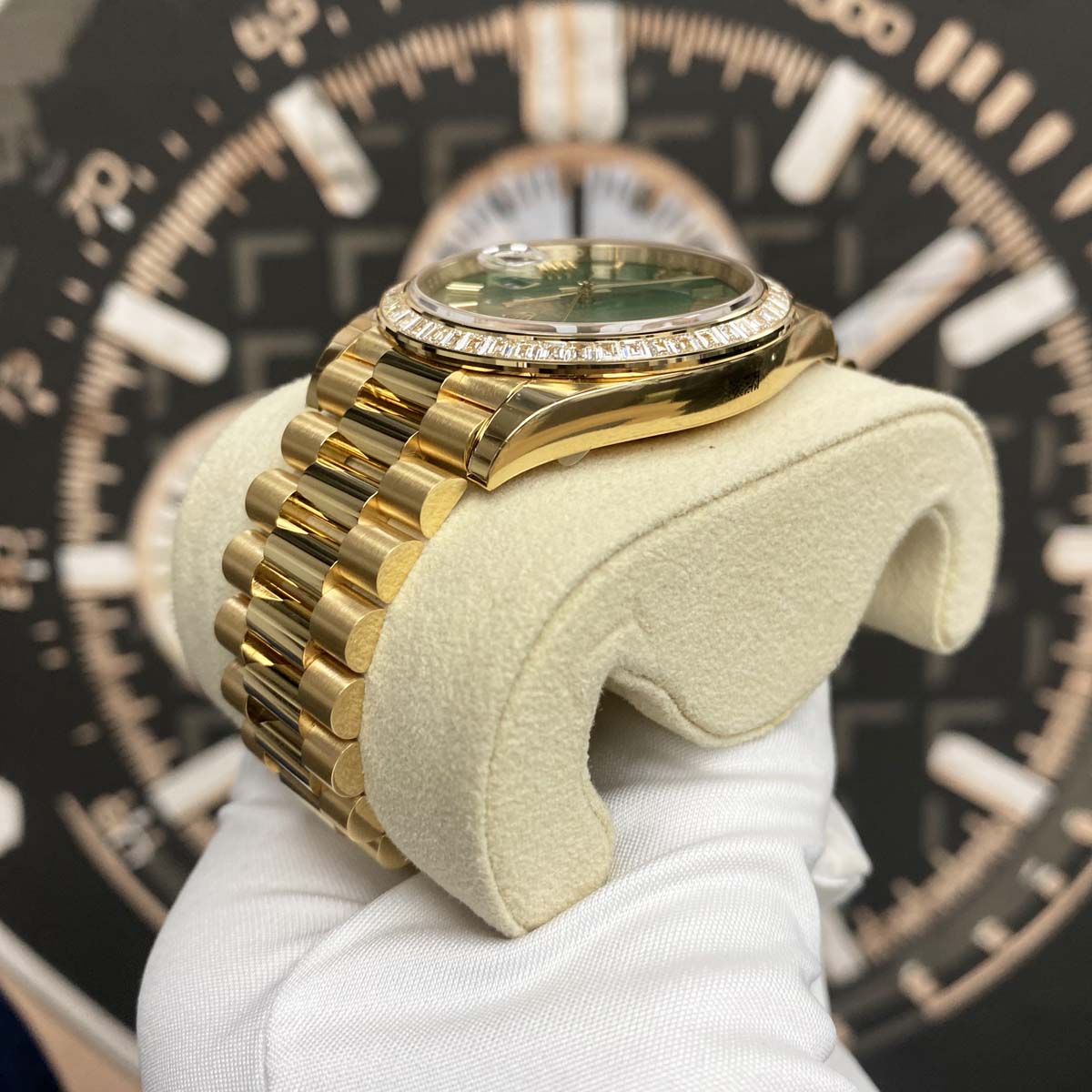 Rolex Day-Date 40mm Baguette Diamond Bezel 228398TBR Yellow Gold Green Roman Dial