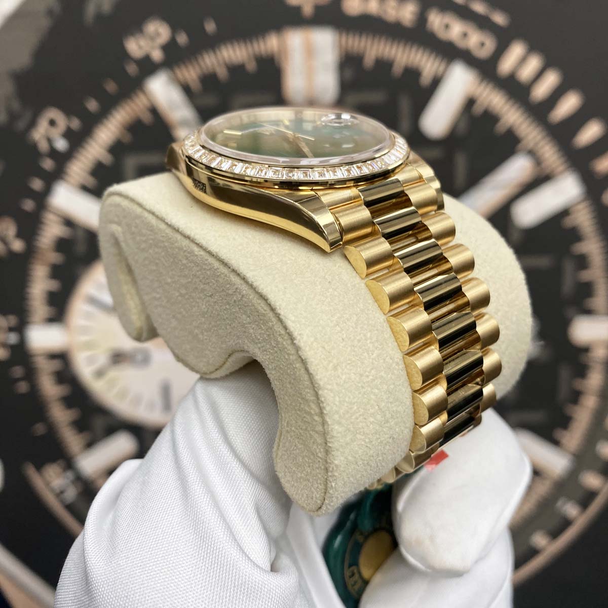 Rolex Day-Date 40mm Baguette Diamond Bezel 228398TBR Yellow Gold Green Roman Dial