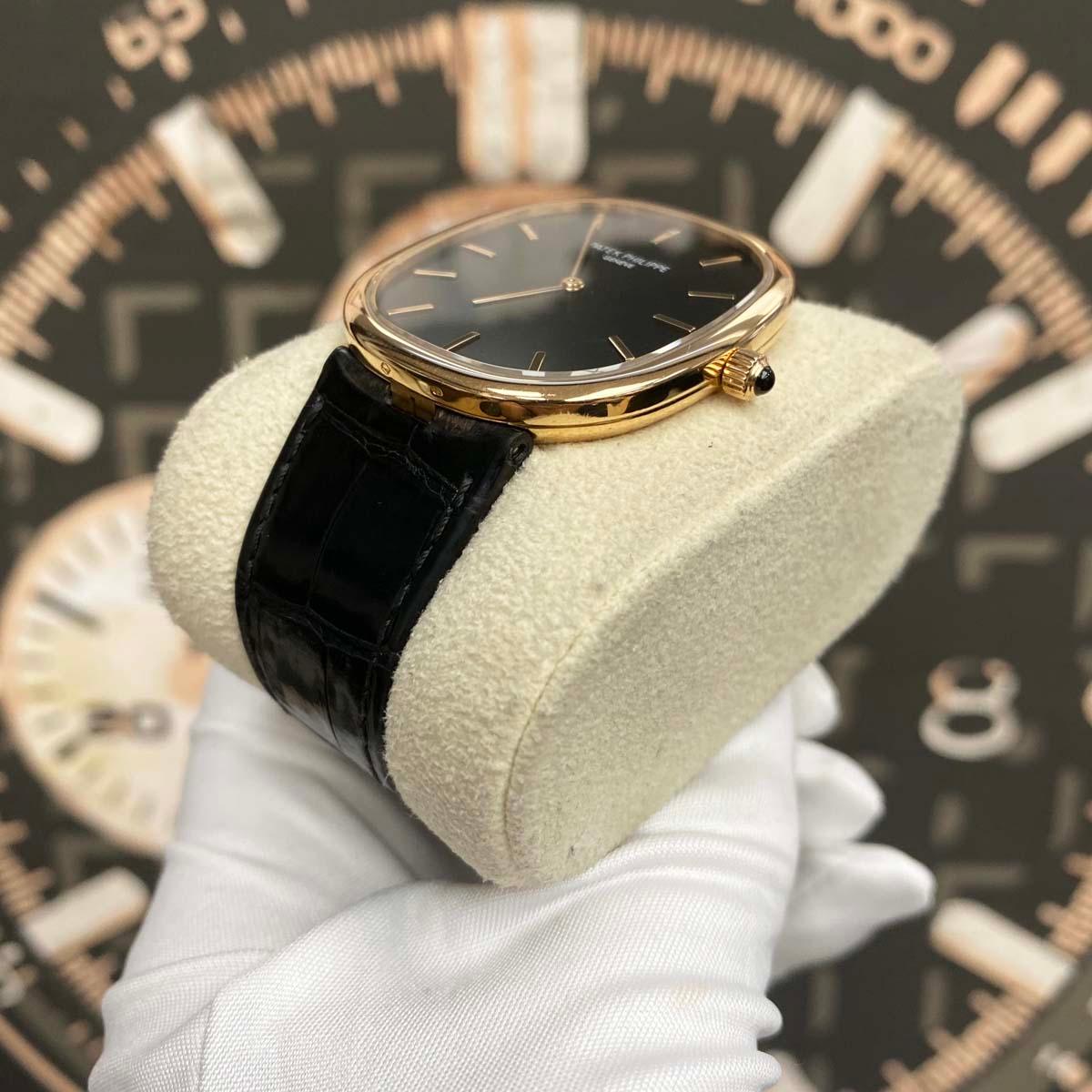 Patek Philippe 50th Anniversary Extra-Thin Golden Ellipse 34mm 5738R Black Dial Pre-Owned - Gotham Trading 