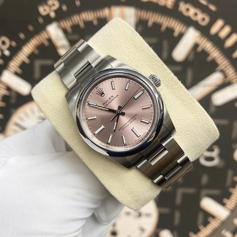 Rolex Oyster Perpetual 34mm Pink Dial Smooth Bezel 124200